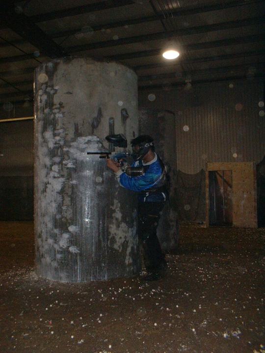 Indoor play behind a paint-covered pillar